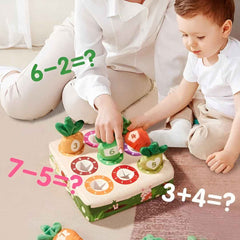 Toddler playing with Carrot Harvest counting toy — develops counting, number recognition and fine motor skills