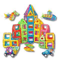 Toddler building a tower with magnetic tiles — promotes creativity, spatial reasoning and fine motor skills