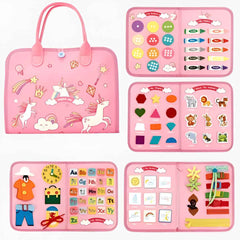 Portable Montessori busy book in pink — unicorn print with shape and animal matching pages; toddler travel toy.